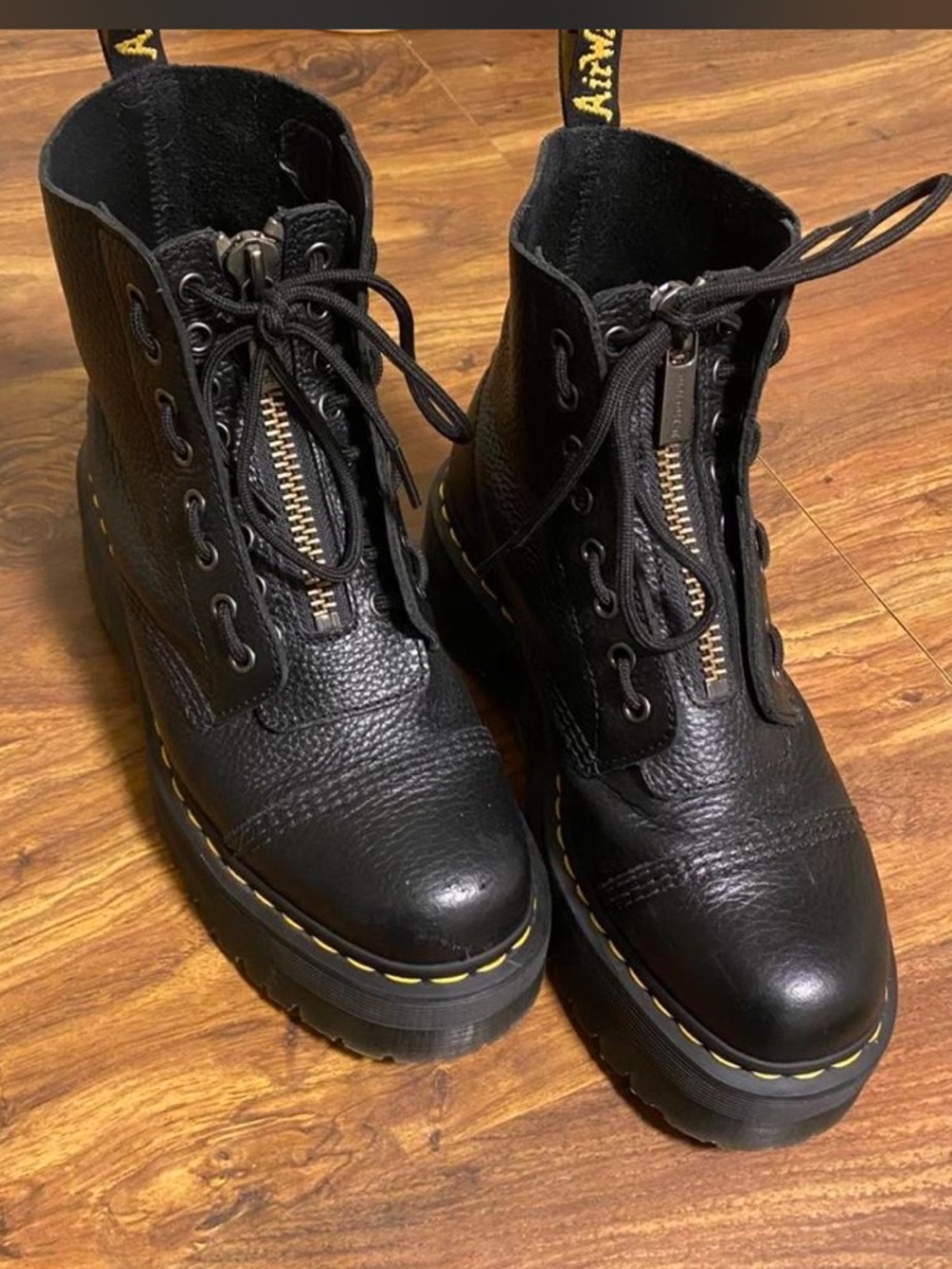 Dr. Martens Black Leather Platform Combat Boots with Yellow Stitching